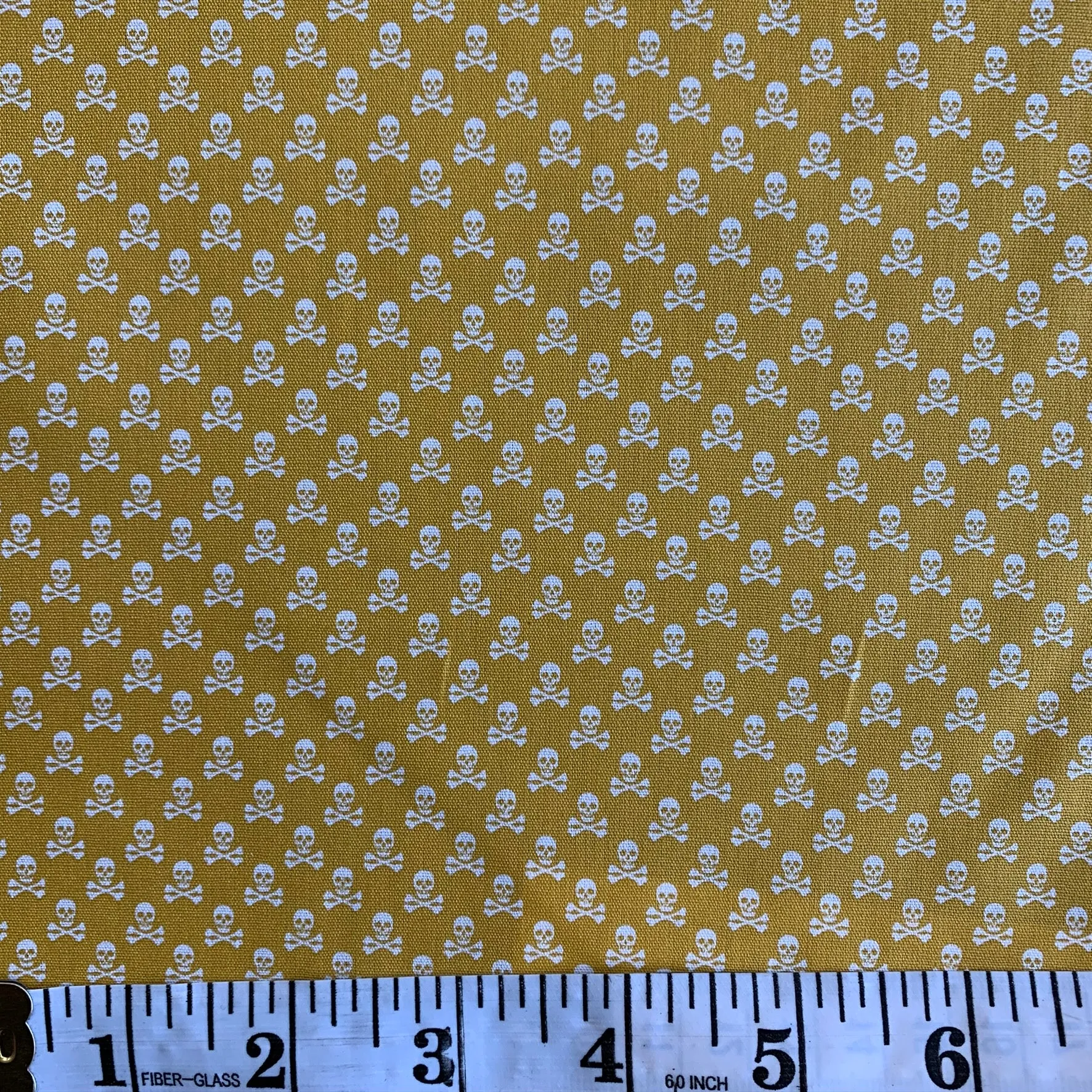 100% Cotton  - Mini Skull and Cross Bones - Mustard - Sold by Half Metre