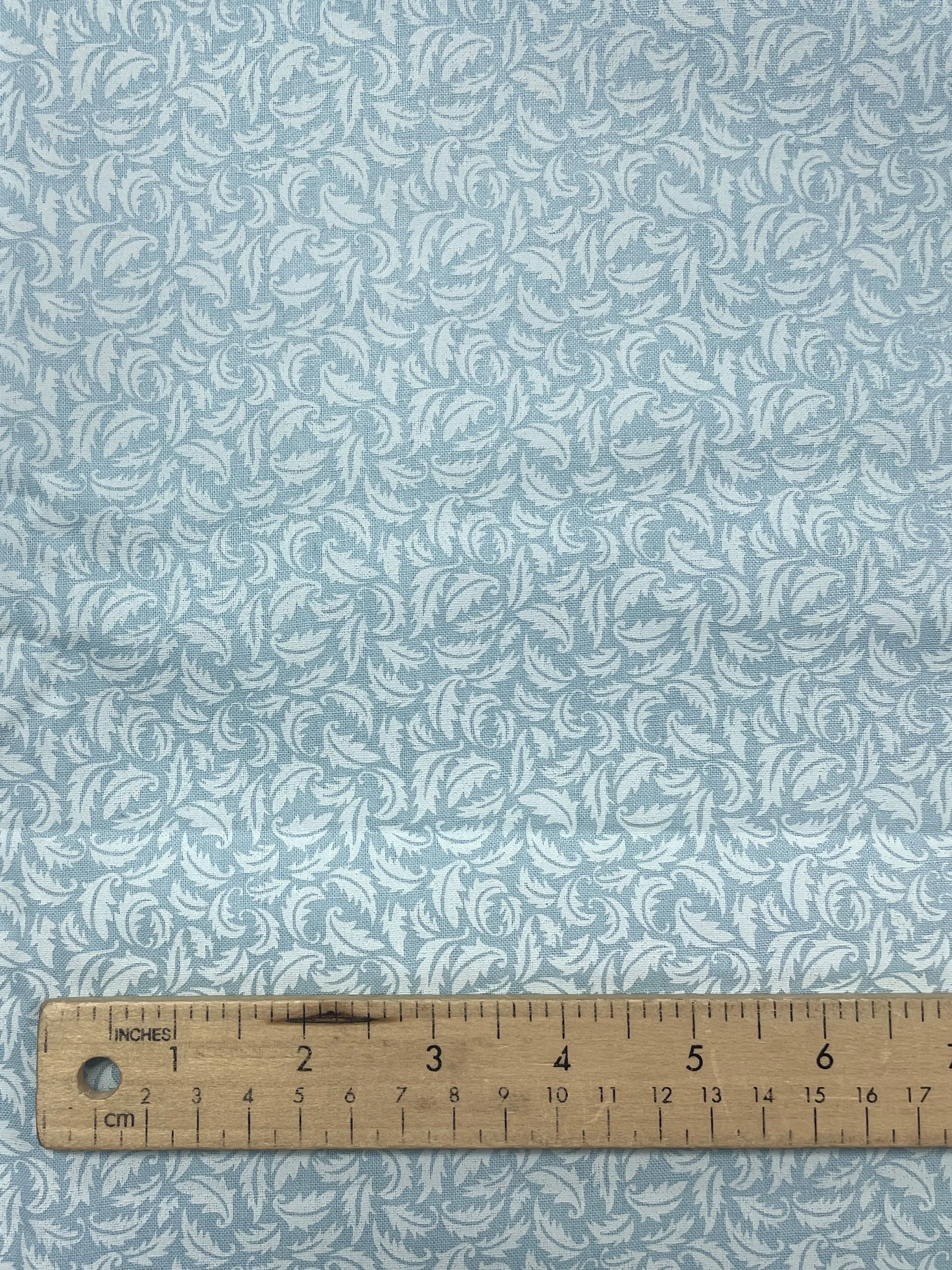 2 1/8 YD Quilting Cotton - Light Blue Printed with White Leaves